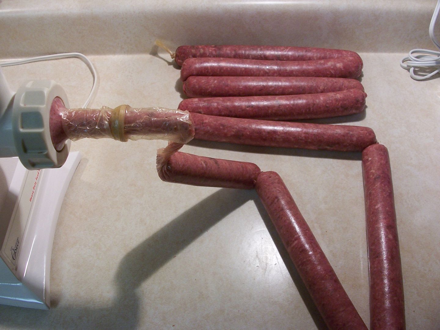 Cowgirl's Country Life Foot Long Venison Beer Brats on the RibOlator )